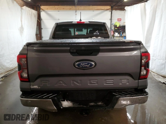 2024 Ford Ranger LARIAT with VIN 1FTER4KH7RLE16810, listed as a Copart auction lot 41364955 with 14,675 mi miles and Salvage Title. Bid and sale history available at carsss.com. Image 6.