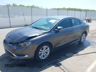 2015 Chrysler 200 Limited z VIN 1C3CCCAB2FN569986, wystawiony jako IAAI lot #42129729 z przebiegiem 100 794 mil mil oraz . Historia ofert i sprzedaży dostępna na DreamBid. Obrazek 17.