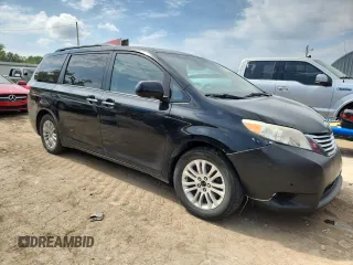 2011 Toyota Sienna XLE AAS with VIN 5TDYK3DC5BS081015, listed as a Copart auction lot 61096595 with 291,855 mi miles and Salvage title. Bid and sale history available at DreamBid. Image 4.