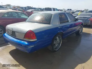 1999 Ford Crown Victoria Police Pkg with VIN 2FAFP71W5XX192230, listed as a IAAI auction lot 41629743 with 170,510 mi miles. Bid and sale history available at carsss.com. Image 4.