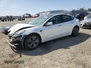 2021 Tesla Model 3 Standard Range Plus with VIN 5YJ3E1EA1MF871986, listed as a Copart auction lot 53389475 with Not Provided miles and Salvage Title. Bid and sale history available at DreamBid. Image 1.