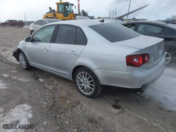 2008 Volkswagen Jetta Sedan Wolfsburg with VIN 3VWRJ71K18M185744, listed as a IAAI auction lot 41389714 with 107,446 mi miles. Bid and sale history available at carsss.com. Image 3.