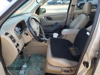 2005 Ford Escape Limited with VIN 1FMYU94195KB35872, listed as a Copart auction lot 63285755 with 145,638 mi miles and Salvage title. Bid and sale history available at DreamBid. Image 7.