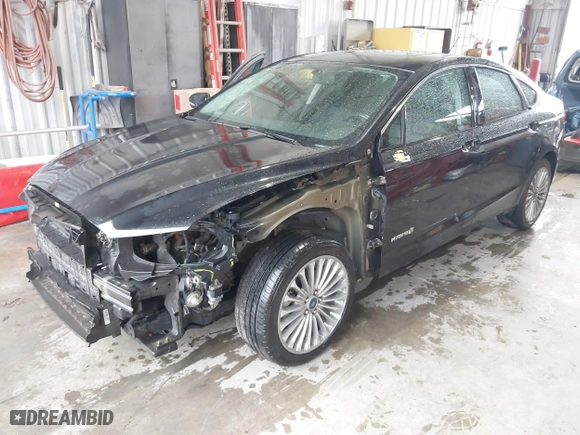 2013 Ford Fusion Titanium Hybrid with VIN 3FA6P0RU4DR281789, listed as a IAAI auction lot 41909115 with 161,008 mi miles. Bid and sale history available at carsss.com. Image 18.