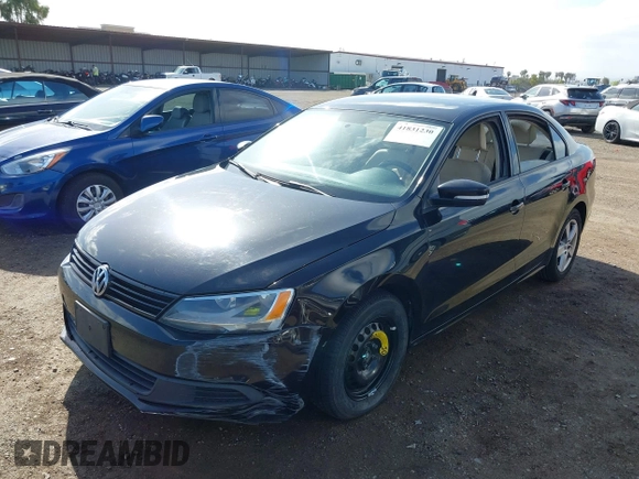 2012 Volkswagen Jetta TDI w/Premium with VIN 3VWLL7AJ3CM469621, listed as a IAAI auction lot 41831230 with 198,871 mi miles and . Bid and sale history available at DreamBid. Image 6.
