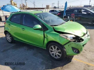 2011 Mazda 2 Touring z VIN JM1DE1HZ4B0115764, wystawiony jako Copart lot #56161455 z przebiegiem 134 274 mil mil oraz Szkoda całkowita • Salvage title. Historia ofert i sprzedaży dostępna na DreamBid. Obrazek 4.