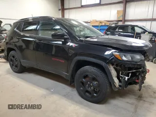 2023 Jeep Compass Trailhawk with VIN 3C4NJDDNXPT506660, listed as a Copart auction lot 56154445 with 92,473 mi miles and Salvage title. Bid and sale history available at DreamBid. Image 4.
