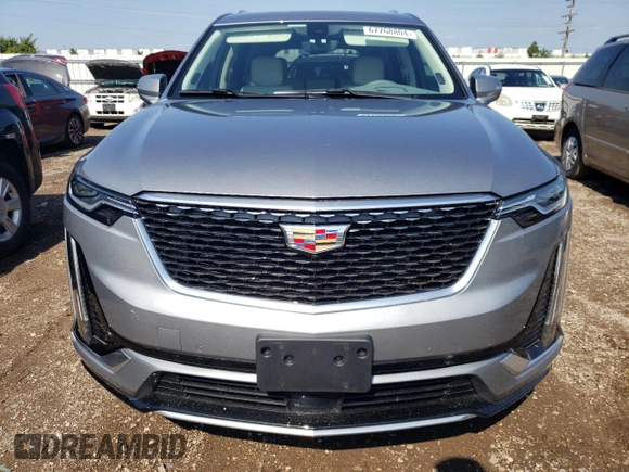 2024 Cadillac XT6 FWD Premium Luxury with VIN 1GYKPCRS7RZ736818, listed as a Copart auction lot 67768804 with 7,145 mi miles and Salvage Title. Bid and sale history available at carsss.com. Image 5.
