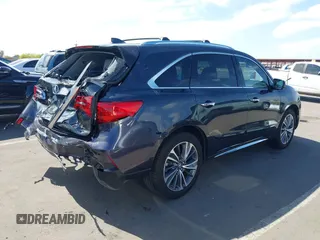 2019 Acura MDX Technology with VIN 5J8YD4H5XKL029023, listed as a IAAI auction lot 42108214 with 73,535 mi miles and . Bid and sale history available at DreamBid. Image 4.