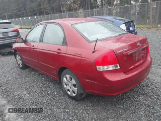 2009 Kia Spectra EX with VIN KNAFE222695621925, listed as a IAAI auction lot 40657622 with 135,647 mi miles. Bid and sale history available at carsss.com. Image 3.