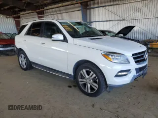 2015 Mercedes-Benz M with VIN 4JGDA5HB6FA452129, listed as a Copart auction lot 51082625 with 105,022 mi miles and Salvage Title. Bid and sale history available at carsss.com. Image 4.