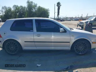 1999 Volkswagen Golf z VIN WVWBA31J0XW484354, wystawiony jako IAAI lot #41653219 z przebiegiem 255 725 mil mil oraz . Historia ofert i sprzedaży dostępna na DreamBid. Obrazek 13.