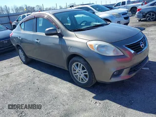 2012 Nissan Versa SV with VIN 3N1CN7AP1CL818558, listed as a IAAI auction lot 41592287 with 163,309 mi miles. Bid and sale history available at carsss.com. Image 1.
