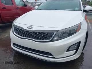 2016 Kia Optima Hybrid with VIN KNAGM4AD9G5092084, listed as a IAAI auction lot 41879089 with 141,927 mi miles. Bid and sale history available at carsss.com. Image 6.