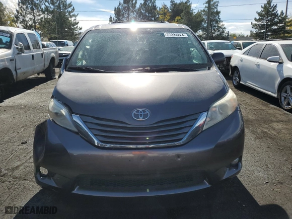 2014 Toyota Sienna XLE with VIN 5TDYK3DC8ES457727, listed as a Copart auction lot 77224224 with 121,879 mi miles and Salvage Title. Bid and sale history available at carsss.com. Image 5.
