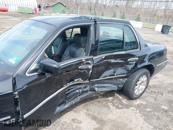 2005 Mercury Grand Marquis LS Premium z VIN 2MEFM75W65X671622, wystawiony jako IAAI lot #41958287 z przebiegiem 154 662 mil mil oraz . Historia ofert i sprzedaży dostępna na DreamBid. Obrazek 6.