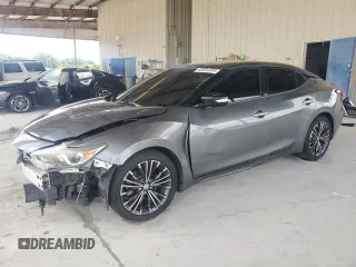 2018 Nissan Maxima SV with VIN 1N4AA6APXJC396640, listed as a Copart auction lot 60884305 with 88,533 mi miles and Salvage title. Bid and sale history available at DreamBid. Image 1.
