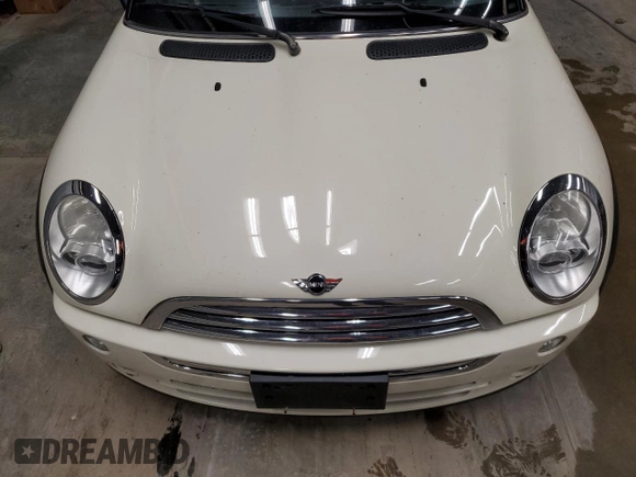 2007 MINI Convertible with VIN WMWRF33567TG17538, listed as a Copart auction lot 76506984 with 75,090 mi miles and Clean Title. Bid and sale history available at DreamBid. Image 11.