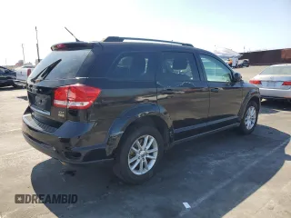 2015 Dodge Journey SXT with VIN 3C4PDCBG6FT718131, listed as a Copart auction lot 62214265 with 108,986 mi miles and Salvage title. Bid and sale history available at DreamBid. Image 3.