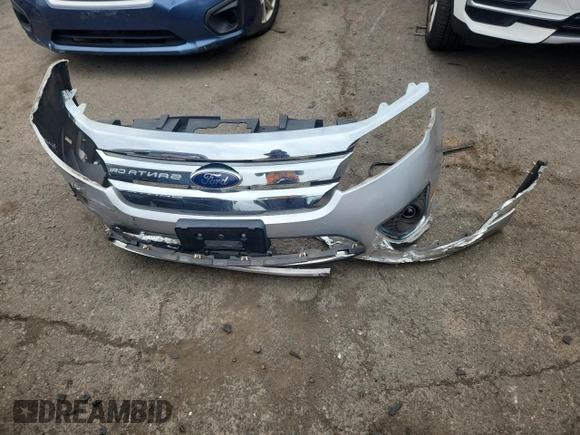 2012 Ford Fusion Hybrid z VIN 3FADP0L34CR227740, wystawiony jako Copart lot #64989475 z przebiegiem 134 862 mil mil oraz Szkoda całkowita • Salvage title. Historia ofert i sprzedaży dostępna na DreamBid. Obrazek 12.