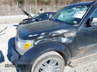 2007 Dodge Nitro SLT with VIN 1D8GU58K67W688374, listed as a IAAI auction lot 41392892 with 97,402 mi miles. Bid and sale history available at carsss.com. Image 6.