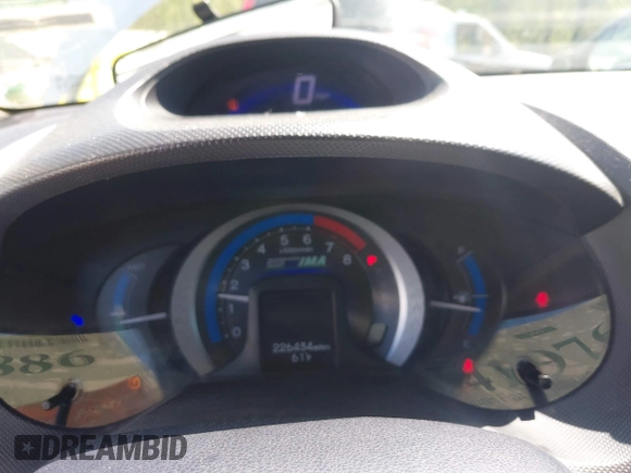 2010 Honda Insight EX with VIN JHMZE2H75AS013109, listed as a IAAI auction lot 41976886 with 226,434 mi miles and . Bid and sale history available at DreamBid. Image 15.