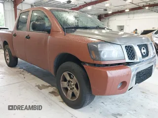 2007 Nissan Titan XE with VIN 1N6BA07A57N233449, listed as a IAAI auction lot 41381833 with 176,720 mi miles. Bid and sale history available at carsss.com. Image 1.