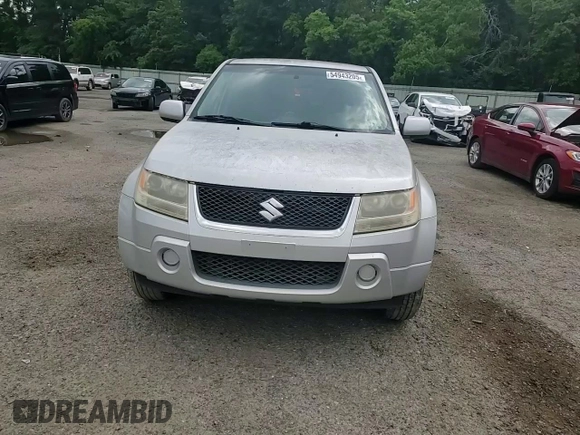 2006 Suzuki Grand Vitara z VIN JS3TE941764101657, wystawiony jako Copart lot #54943205 z przebiegiem 206 744 mil mil oraz Szkody całkowita. Historia ofert i sprzedaży dostępna na DreamBid. Obrazek 14.