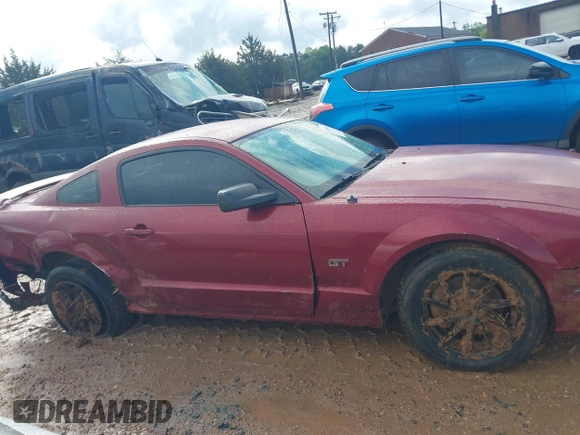 2006 Ford Mustang GT Deluxe with VIN 1ZVFT82H265195370, listed as a IAAI auction lot 42018364 with 129,165 mi miles. Bid and sale history available at carsss.com. Image 14.