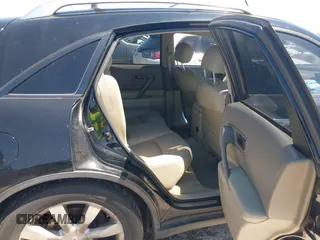 2005 Infiniti FX with VIN JNRAS08U65X109633, listed as a IAAI auction lot 41957837 with 153,370 mi miles. Bid and sale history available at carsss.com. Image 8.
