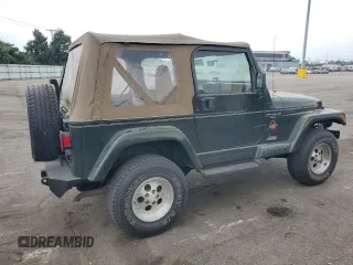 1998 Jeep Wrangler Sahara with VIN 1J4FY49S2WP707318, listed as a Copart auction lot 59508635 with 144,948 mi miles and Clean title. Bid and sale history available at DreamBid. Image 3.