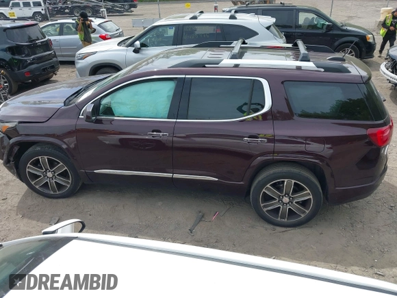 2017 GMC Acadia Denali with VIN 1GKKNXLS7HZ216729, listed as a IAAI auction lot 42256467 with 87,302 mi miles and . Bid and sale history available at DreamBid. Image 14.