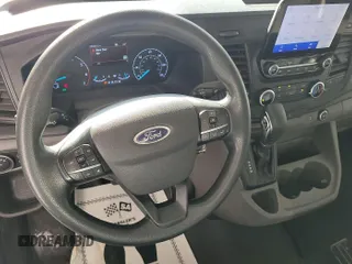 2020 Ford Transit Cargo with VIN 1FTBR2YG3LKA51867, listed as a IAAI auction lot 42787593 with 89,403 mi miles and . Bid and sale history available at DreamBid. Image 11.