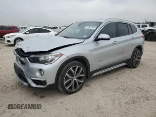 2018 BMW X1 sDrive28i with VIN WBXHU7C32J5L05237, listed as a Copart auction lot 51523905 with 75,638 mi miles and Salvage Title. Bid and sale history available at carsss.com. Image 1.