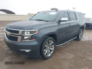 2020 Chevrolet Suburban Premier with VIN 1GNSCJKC8LR290783, listed as a IAAI auction lot 42636126 with 59,371 mi miles and . Bid and sale history available at DreamBid. Image 2.