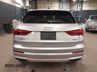 2021 Audi Q3 Premium with VIN WA1AUCF34M1078805, listed as a IAAI auction lot 42026360 with 38,473 mi miles and . Bid and sale history available at DreamBid. Image 16.