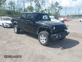 2023 Jeep Gladiator Willys z VIN 1C6HJTAG9PL528374, wystawiony jako IAAI lot #41913629 z przebiegiem 42 374 mil mil oraz . Historia ofert i sprzedaży dostępna na DreamBid. Obrazek 1.