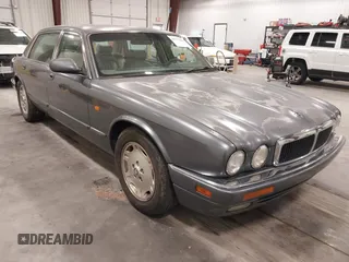 1997 Jaguar XJ with VIN SAJHX6247VC797159, listed as a IAAI auction lot 42271686 with Not provided miles and . Bid and sale history available at DreamBid. Image 1.