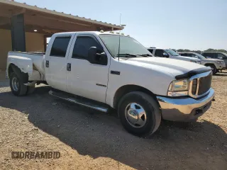 1999 Ford F-350 XL z VIN 1FTWW32F7XED47740, wystawiony jako Copart lot #69288404 z przebiegiem 201 638 mil mil oraz Szkoda całkowita • Salvage title. Historia ofert i sprzedaży dostępna na DreamBid. Obrazek 4.
