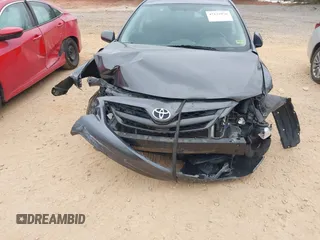 2013 Toyota Corolla L with VIN 2T1BU4EE5DC987182, listed as a IAAI auction lot 42125976 with 122,785 mi miles and . Bid and sale history available at DreamBid. Image 6.