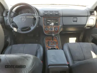 2002 Mercedes-Benz M 320/430/500 z VIN 4JGAB54E12A323838, wystawiony jako Copart lot #59057205 z przebiegiem 141 574 mil mil oraz Czysty tytuł • Clean title. Historia ofert i sprzedaży dostępna na DreamBid. Obrazek 8.