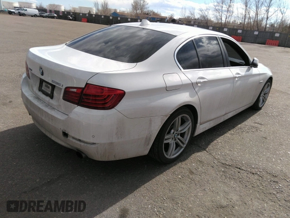 2014 BMW 5 Series 535i xDrive with VIN WBA5B3C5XED535441, listed as a IAAI auction lot 41622013 with 132,024 mi miles and . Bid and sale history available at carsss.com. Image 4.