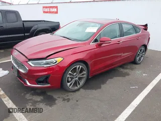 2019 Ford Fusion Titanium with VIN 3FA6P0K98KR179513, listed as a IAAI auction lot 41820059 with 112,155 mi miles. Bid and sale history available at carsss.com. Image 2.