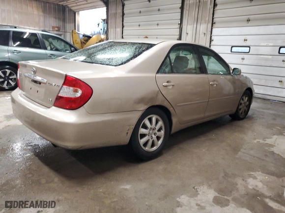 2004 Toyota Camry LE with VIN 4T1BF30K54U573108, listed as a Copart auction lot 84451194 with 173,466 mi miles and Salvage Title. Bid and sale history available at carsss.com. Image 3.