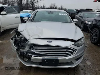 2018 Ford Fusion SE z VIN 3FA6P0H79JR270777, wystawiony jako Copart lot #45319755 z przebiegiem 69 152 mil mil oraz Szkoda całkowita • Salvage title. Historia ofert i sprzedaży dostępna na DreamBid. Obrazek 5.