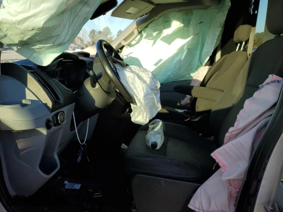 2016 Ford Transit Cargo with VIN 1FTYE1CM5GKB56512, listed as a Copart auction lot 82561724 with Not Provided miles and Salvage Title. Bid and sale history available at carsss.com. Image 7.