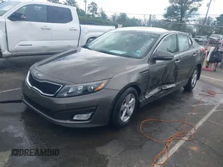 2015 Kia Optima LX with VIN 5XXGM4A72FG400848, listed as a IAAI auction lot 40802198 with 173,270 mi miles and . Bid and sale history available at DreamBid. Image 2.