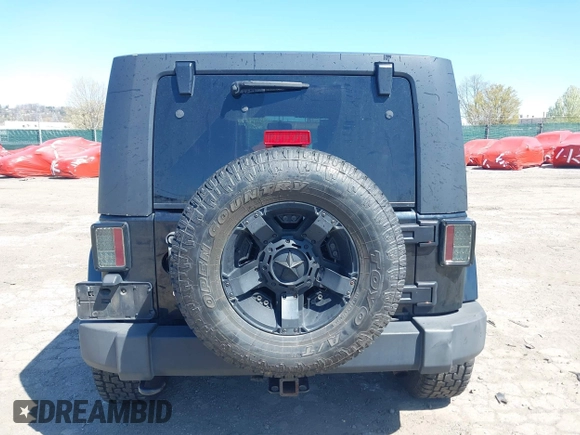 2010 Jeep Wrangler Unlimited Sahara with VIN 1J4HA5H17AL140941, listed as a IAAI auction lot 42004203 with 126,100 mi miles. Bid and sale history available at carsss.com. Image 15.