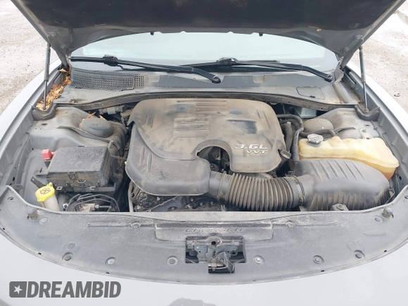 2019 Dodge Charger SXT with VIN 2C3CDXBG7KH554272, listed as a IAAI auction lot 41964492 with 126,174 mi miles. Bid and sale history available at carsss.com. Image 10.
