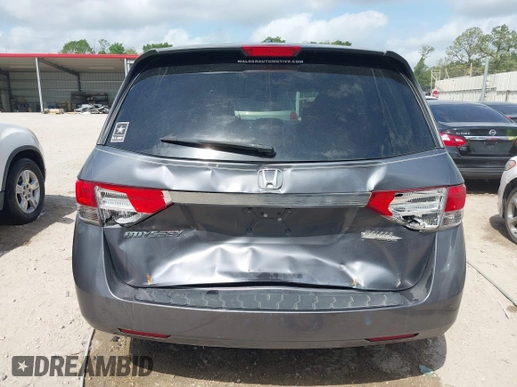 2014 Honda Odyssey EX-L with VIN 5FNRL5H69EB075115, listed as a IAAI auction lot 42046386 with 200,340 mi miles and . Bid and sale history available at carsss.com. Image 6.